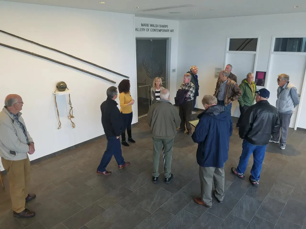 Members touring a gallery
